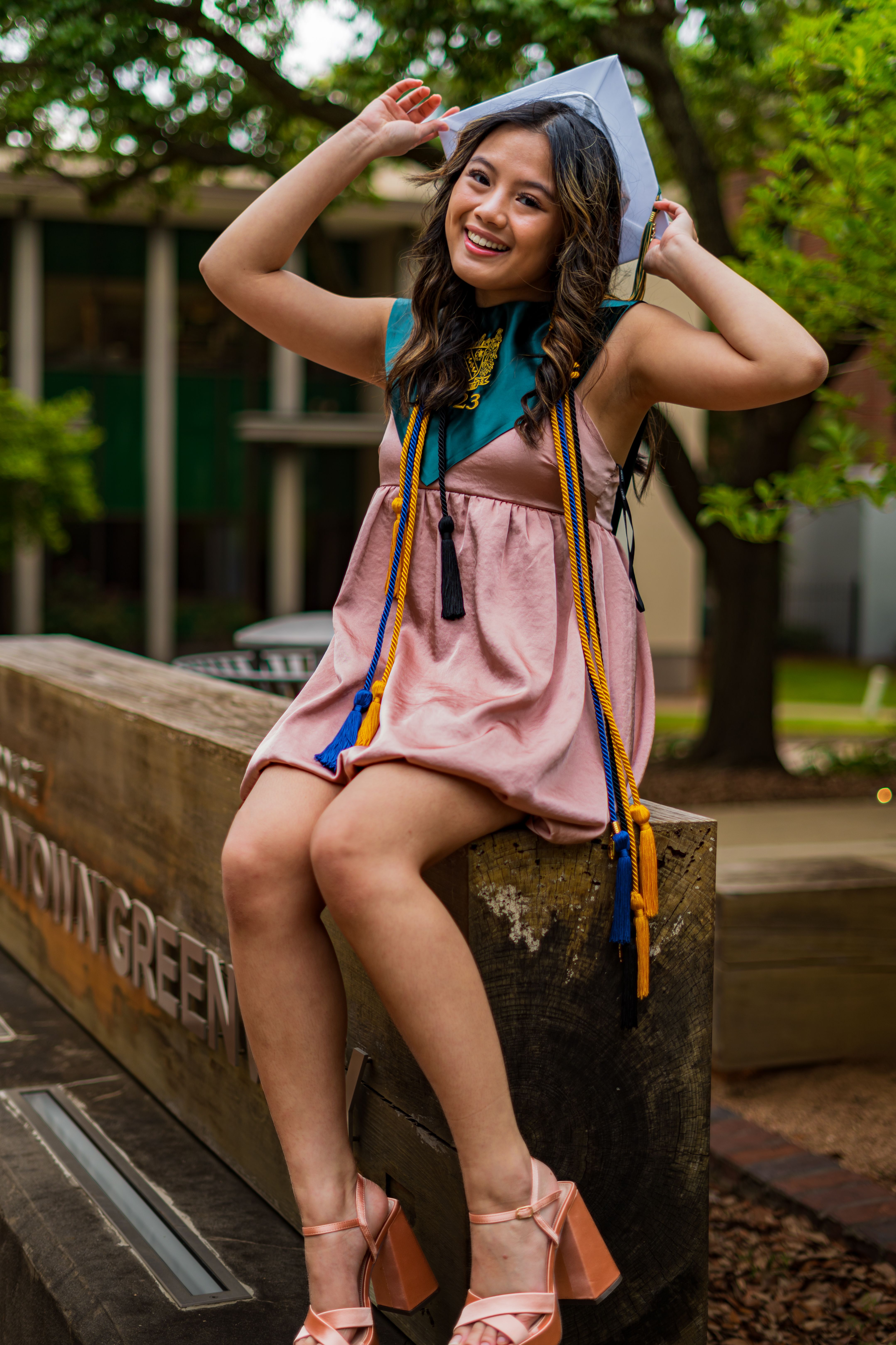 girl holding gradutation cap
